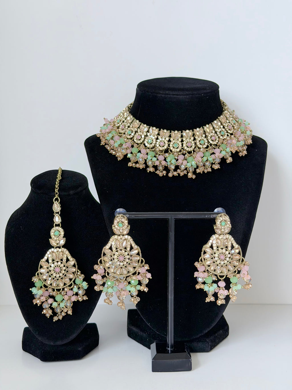Bollywood Krithika Stonework Necklace Set with Earrings and Mangtika