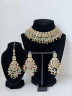 Bollywood Krithika Stonework Necklace Set with Earrings and Mangtika