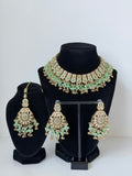 Bollywood Krithika Stonework Necklace Set with Earrings and Mangtika